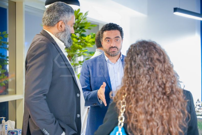 Business discussion in modern office setting.